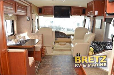 Photo of the inside of the rental Motorhome looking forward