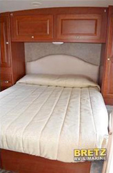 Photo of the Queen-sized bed in the rental Motorhome